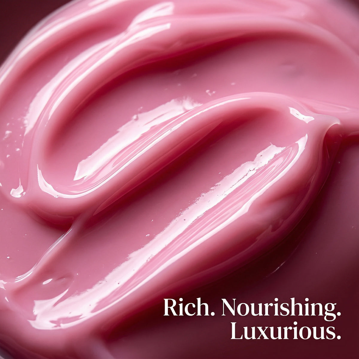 Close-up of pink cream with 'Rich. Nourishing. Luxurious.' text